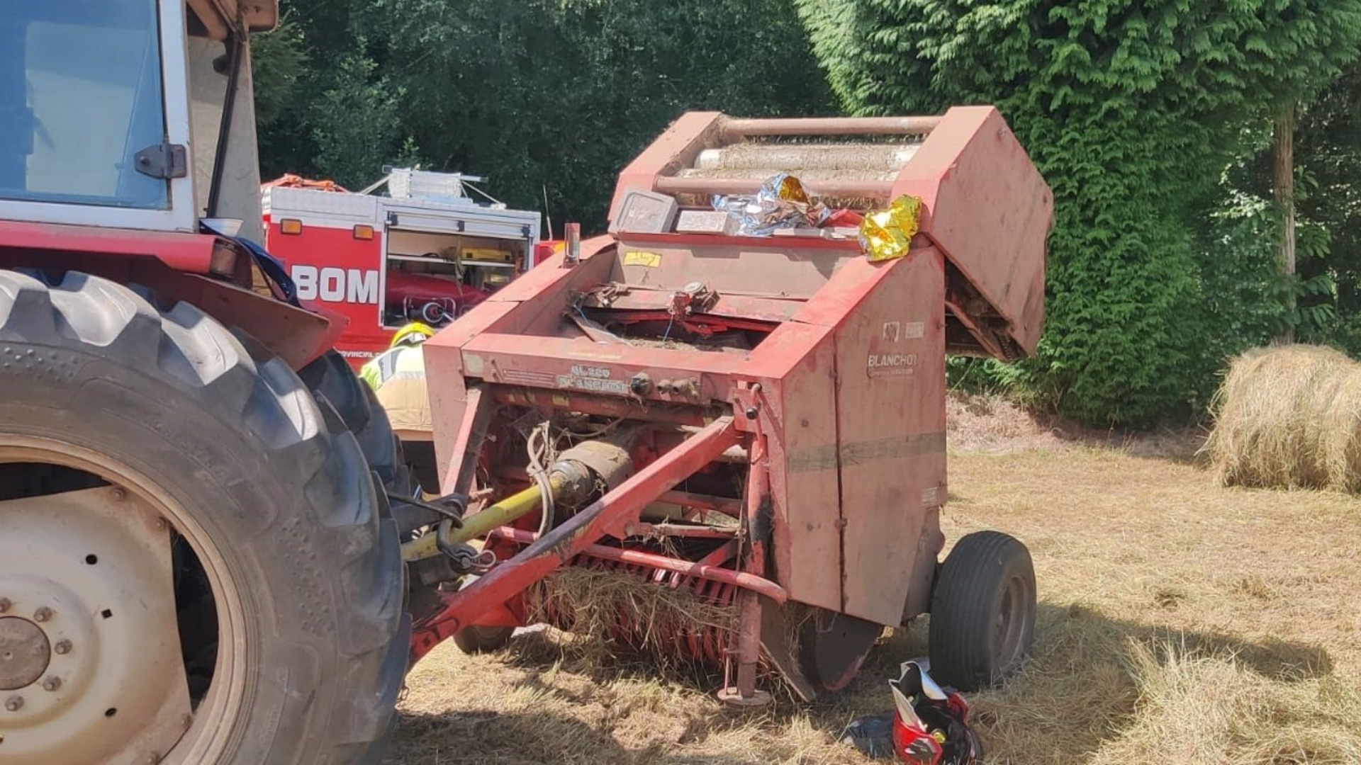 Monfero máquina agrícola brazo atrapado
